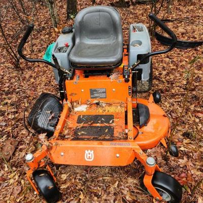 Husqvarna zero turn mower.  Not running, but can be repaired or used for parts.
