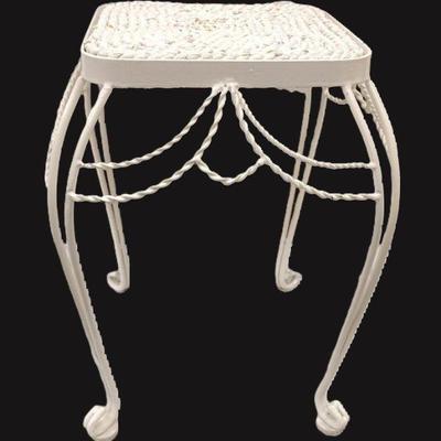 DIMINUATIVE METAL STOOL