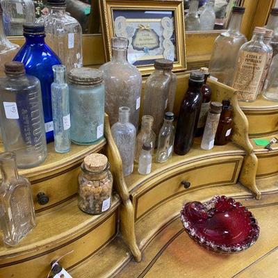 Assortment of antique bottles
