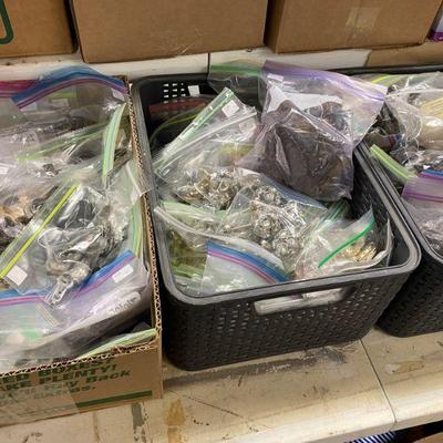 Large assortment of knobs and handles from antique to modern
