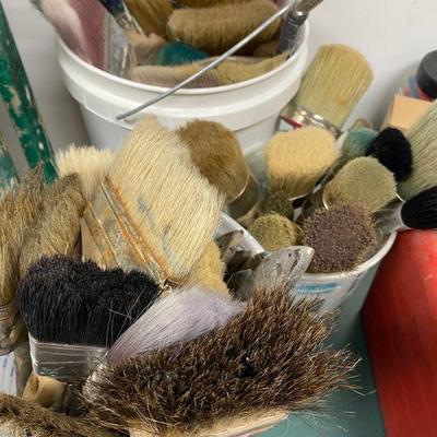 Large assortment of paint brushes for painting and waxing