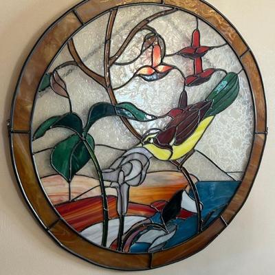 Several beautiful stained glass windows. 