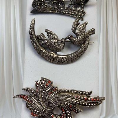 Three vintage pins