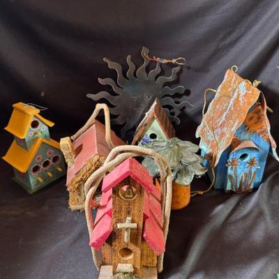 Birdhouses And Sun
