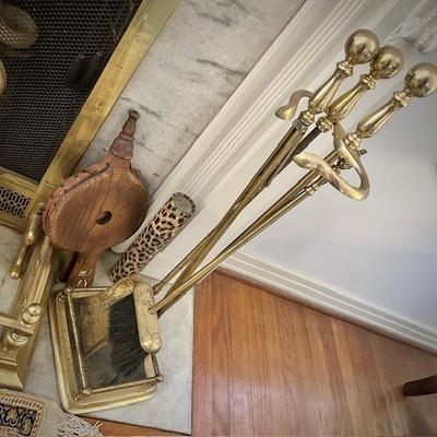 Vintage brass fireplace bumper, andirons and tools