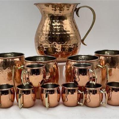 Lot 087   
Traditional Copper - Moscow Mule Serving Set