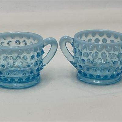 Lot 045   
Fenton Colonial Blue Opalescent Creamer & Pitcher Set