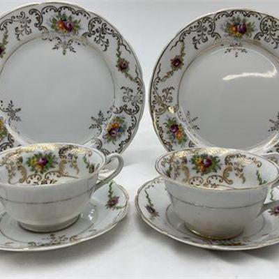 Lot 051   
Tea for Two - Hand Painted TeaCups & Saucers