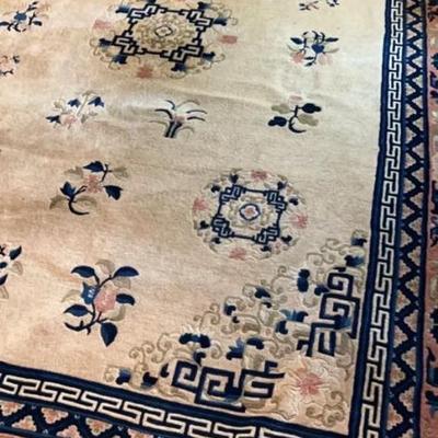 Vintage Chinese area rug with peach, blues & tan.