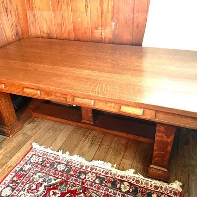Antique quarter sawn oak partners desk/ library table. 42x84”. There’s a glass top as well.