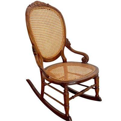 Lot 022-037  
Children's Solid Oak Rocking Chair with Cane Seating
