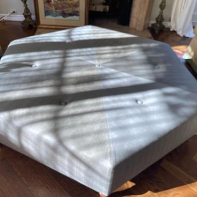OTTOMAN 5 FEET FROM SIDE TO SIDE.
