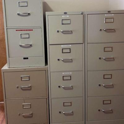 Four Metal Filing Cabinets