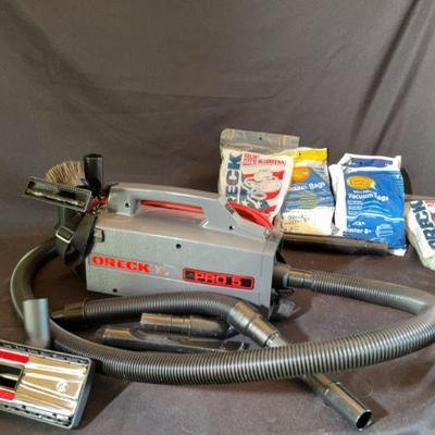 OreckXLPRO5 Vacuum New Not In Box With Attachments And 30 Vac Bags