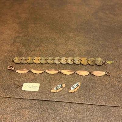 https://ctbids.com/estate-sale/33681/item/3766750/Copper-like-Penny-Bracelet-And-Brass-Leaf-Bracelet-And-Earrings