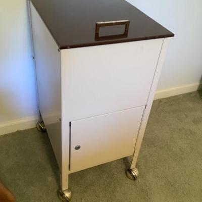 $22 metal filing cabinet on casters 27