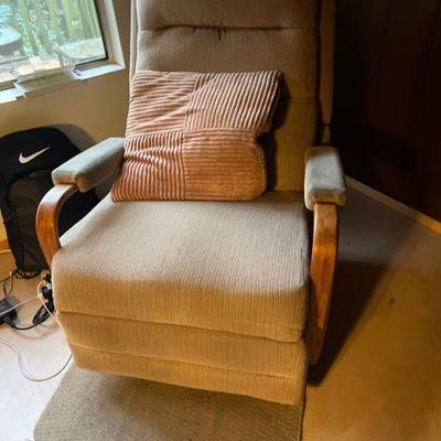 Cusioned armchair
