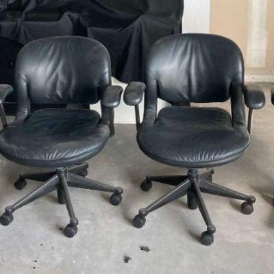 Pa104 four black rolling office chairs
