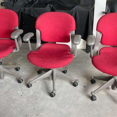 Pa110 three red rolling office chairs