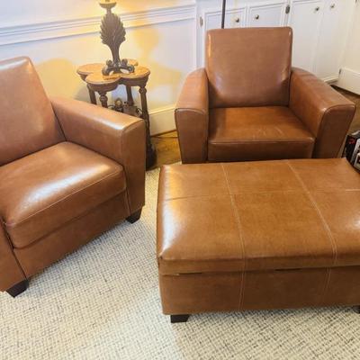 LEATHER CHAIRS AND OTTERMAN
