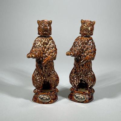 (2pc) PAIR EZRA BROOKS BEAR WHISKEY BOTTLES | Pair of bear-form ceramic Ezra Brooks Whiskey Bottles - h. 14 x w. 4.5 x l. 5 in

