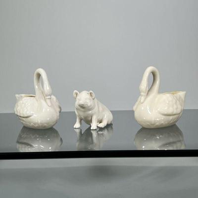 (3pc) PAIR BELLEEK SWANS & OTHER | Pair of Belleek porcelain swan bowls & small pig figurine - h. 3.5 x w. 2.5 x l. 4.5 in

