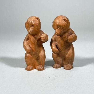 (2pc) PAIR ARGENTINIAN CARVED BEARS | Pair of carved wood bear figures, marked on bottom “Argentina” - h. 5 x w. 2.5 x l. 2.5 in

