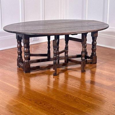 Oval Drop Leaf Coffee Table | h. 17.5 x w. 34 x l. 46.5 in

