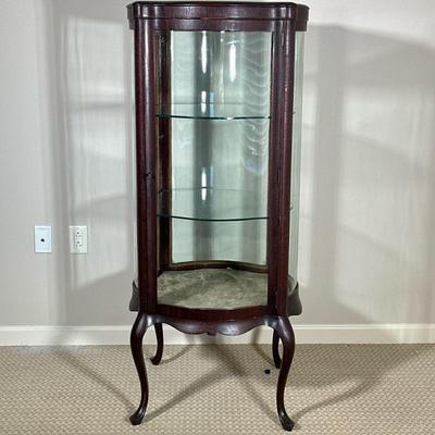 GLASS DISPLAY CASE | Carved wood & glass display with rounded glass sides with 2 glass shelves over cabriole legs. - h. 53 x w. 28 x...