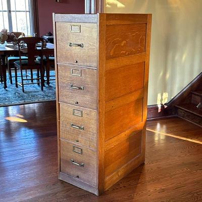 GLOBE GOLDEN OAK FILING CABINET | Having four drawers - h. 52.5 x w. 16.5 x d. 28 in. in

