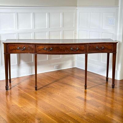 FEDERAL STYLE SIDEBOARD BUFFET | 20th century, of serpentine shape, having three frieze drawers over square tapering legs terminating in...