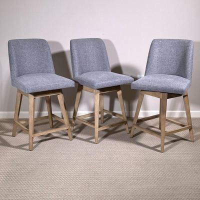 (3pc) SWIVEL ROUND BACK STOOLS | Set of three round back upholstered swiveling bar stools on wood bases. - h. 36 x w. 18 x d. 22 in

