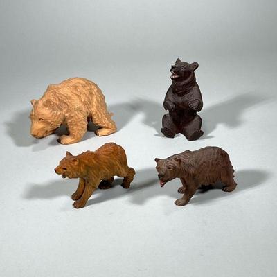 (4pc) CARVED WOOD BEAR FIGURES | Lot of 4 carved wood brown bears including bear marked “Hawaii” - h. 4.5 x w. 4 x l. 7 in (largest)

