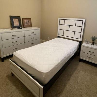 Twin bed with dresser and nightstand (purchased May 2024).  Twin mattress from Texas Mattress Makers (manufactured May 2024).