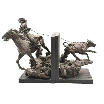 Lot 108-001   
Decorator Cowboy and Calf Sculpted Bookends