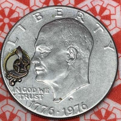 Eisenhower dollar embellished with crescent moon