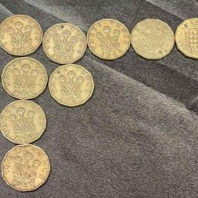 Uk three pence coins