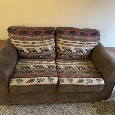 Cabin style couches rarely used 