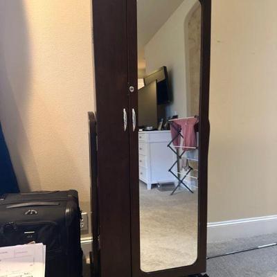 Jewelry armoire with mirror