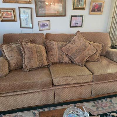 Sofa and nice pillows and some nice print