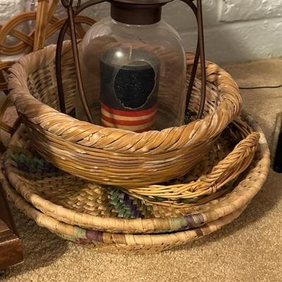 Many hand woven baskets