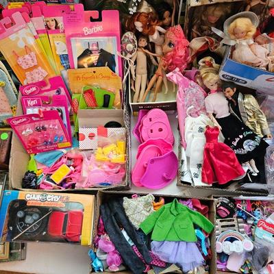 LOTS of Barbie dolls, Barbie clothes & accessories. Most are still new in box. Other dolls & accessories as well.