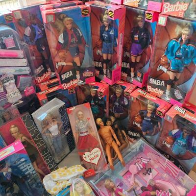 LOTS of Barbie dolls, Barbie clothes & accessories. Most are still new in box. Other dolls & accessories as well.
