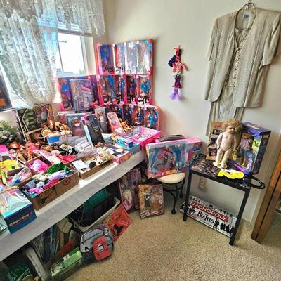 LOTS of Barbie dolls, Barbie clothes & accessories. Most are still new in box. Other dolls & accessories as well.