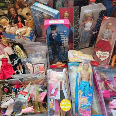 LOTS of Barbie dolls, Barbie clothes & accessories. Most are still new in box. Other dolls & accessories as well.
