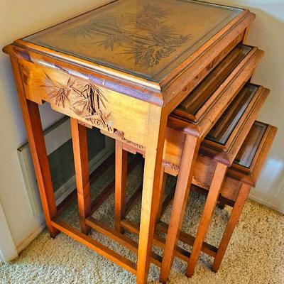 Vintage gorgeous set of 4 nesting table set.