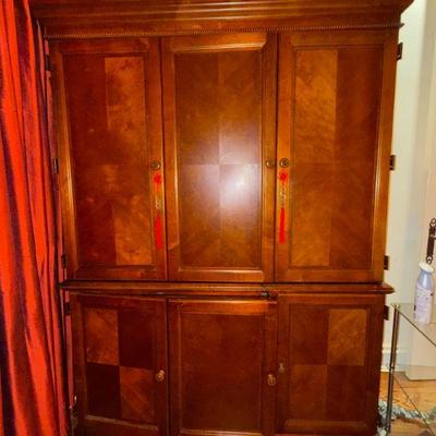 Large walnut i and mahogany entertainment center