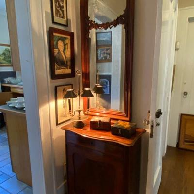 mahogany entry way piece with antique carved mirror