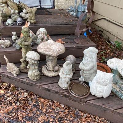 large assortment of concrete critters