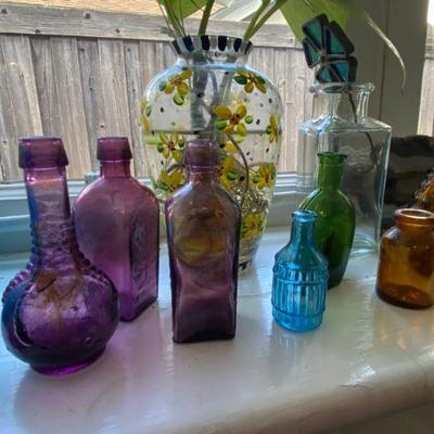 assortment of colorful vases